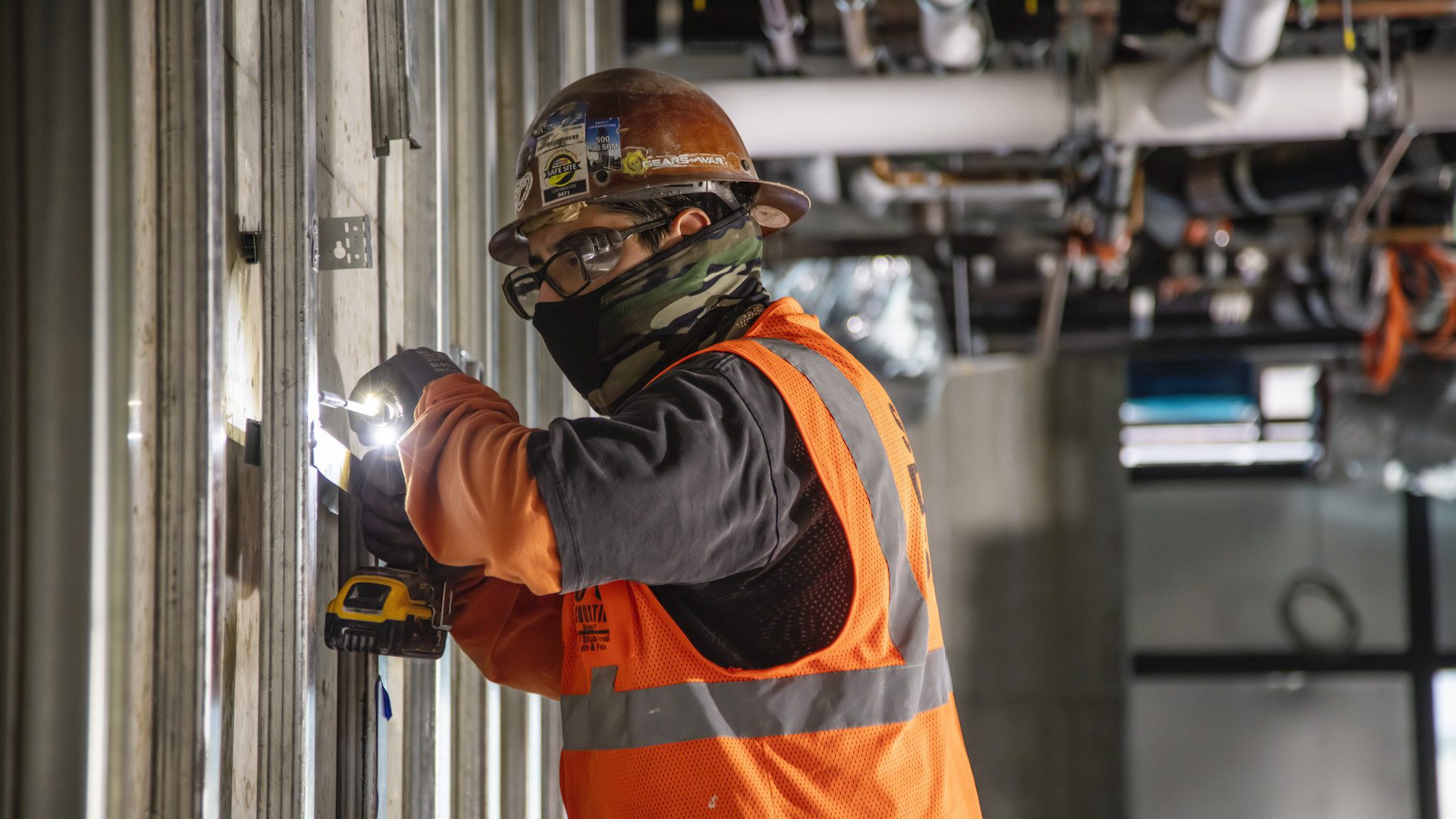 Subcontractor trades worker fastening framing